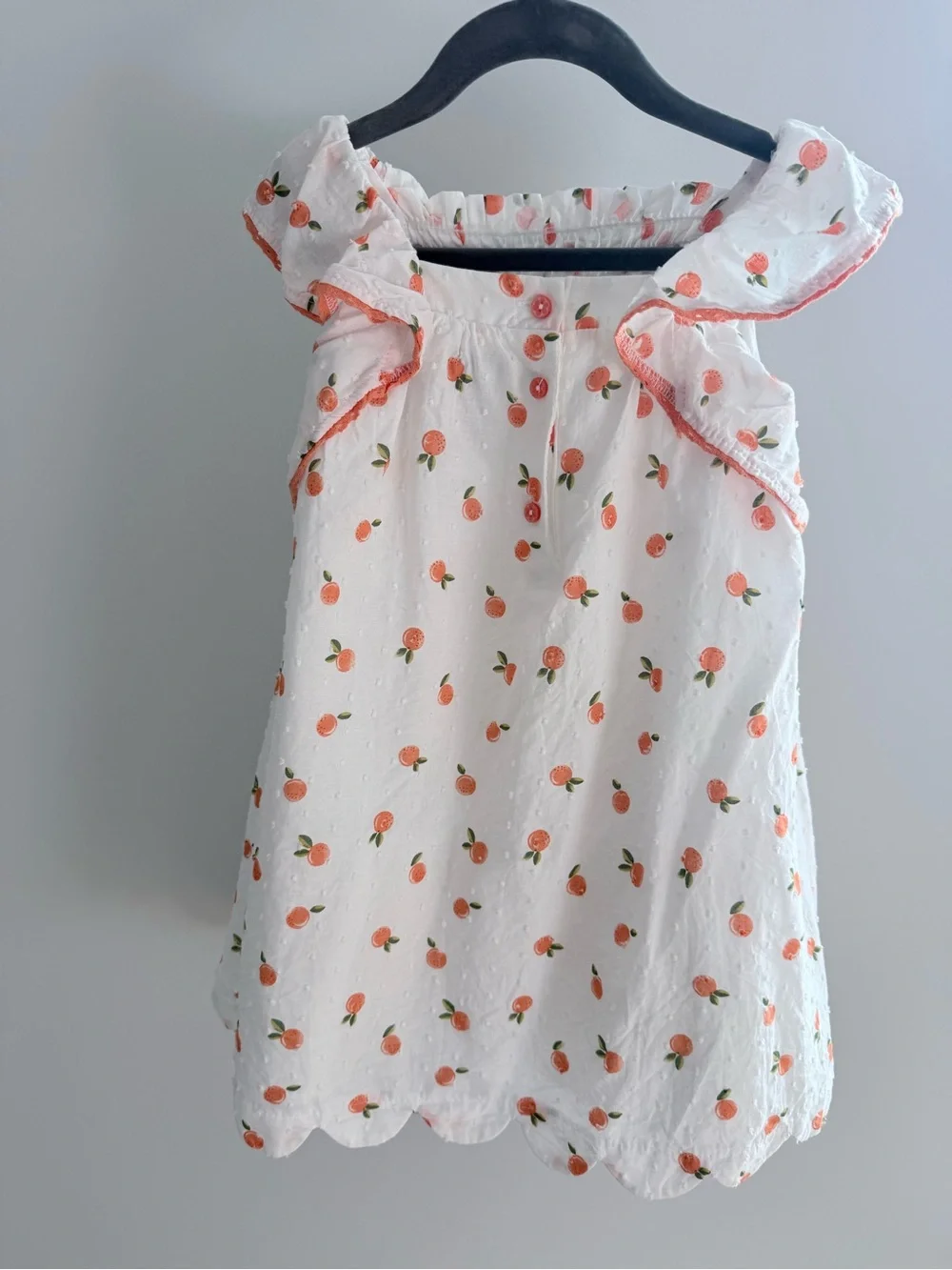 Rachel Zoe White Dress with Peach Print and Orange Straw Bag